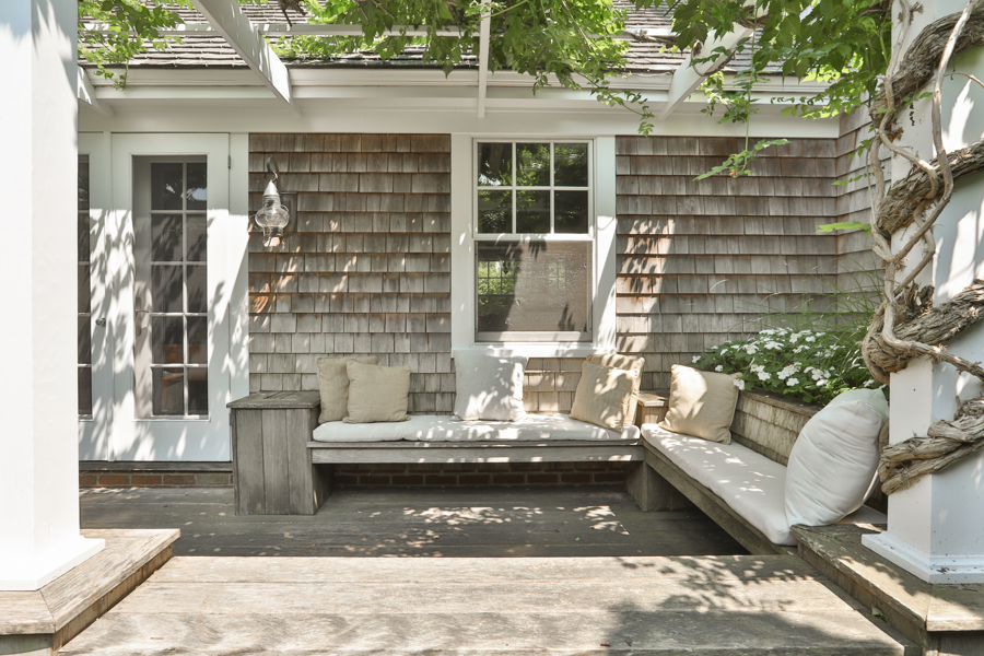 37 West Tisbury Road Edgartown, MA 02539 - Photo 40 of 45 a view of a patio with couches and potted plants