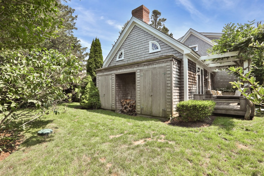 37 West Tisbury Road Edgartown, MA 02539 - Photo 43 of 45 a view of a house with a garden