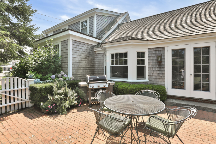 37 West Tisbury Road Edgartown, MA 02539 - Photo 44 of 45 a view of a house with backyard and sitting area
