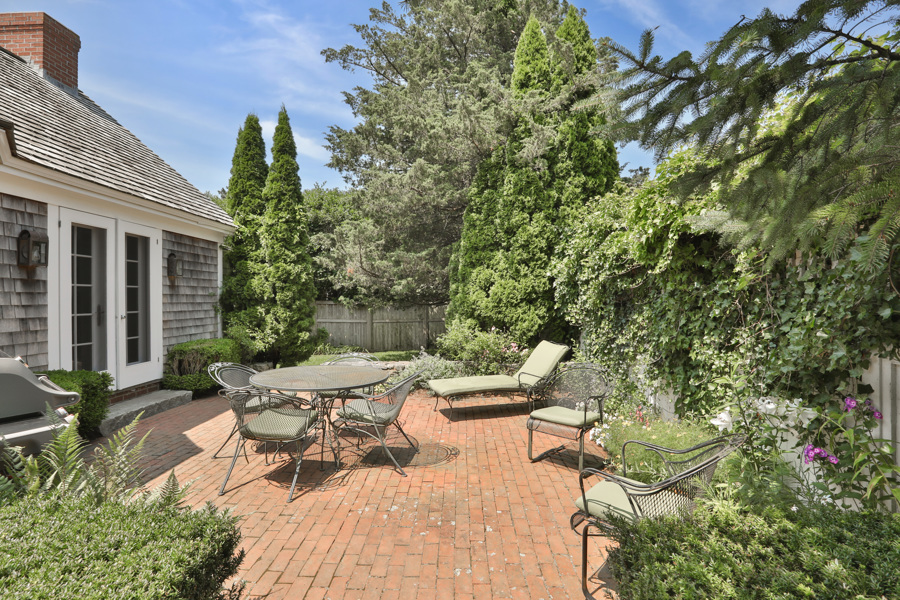 37 West Tisbury Road Edgartown, MA 02539 - Photo 7 of 45 a view of a backyard with sitting area