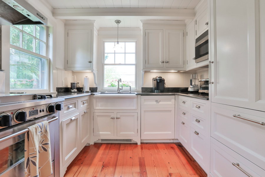 37 West Tisbury Road Edgartown, MA 02539 - Photo 10 of 45 a kitchen with stainless steel appliances cabinets a window and a sink