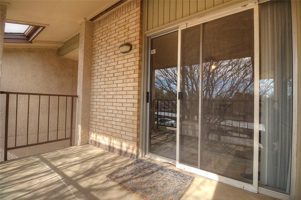 12818 Midway Road, Unit 2068 Dallas, TX 75244 - Photo 5 of 12 a view of outdoor space with balcony