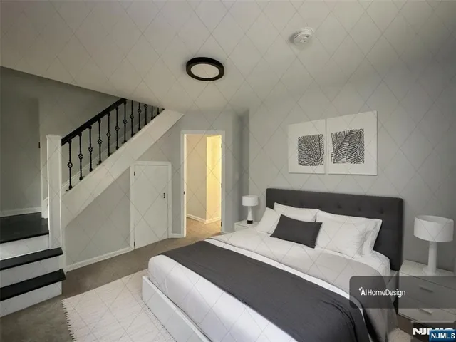 a bedroom with a large bed and a chandelier