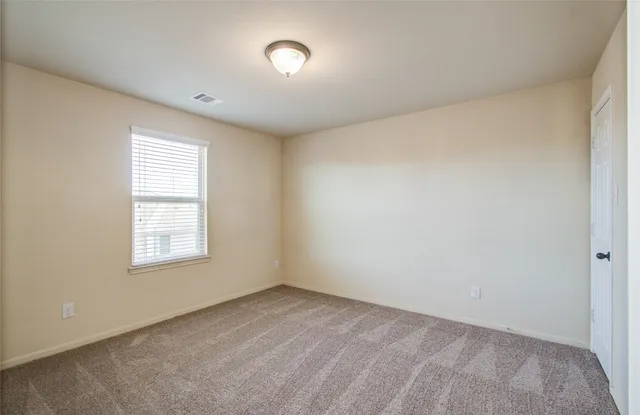 a view of a backyard with a garden