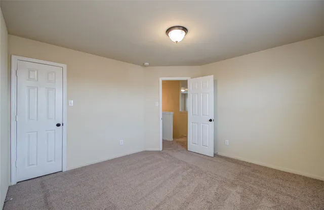 a view of a backyard of the house