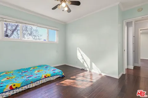 a room with toys and wooden floor