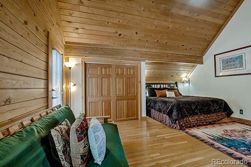 146 Protector Place Breckenridge, CO 80424 - Photo 11 of 18 a spacious bedroom with a bed and a window