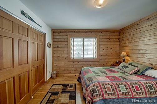 146 Protector Place Breckenridge, CO 80424 - Photo 15 of 18 a bedroom with a bed next to a window