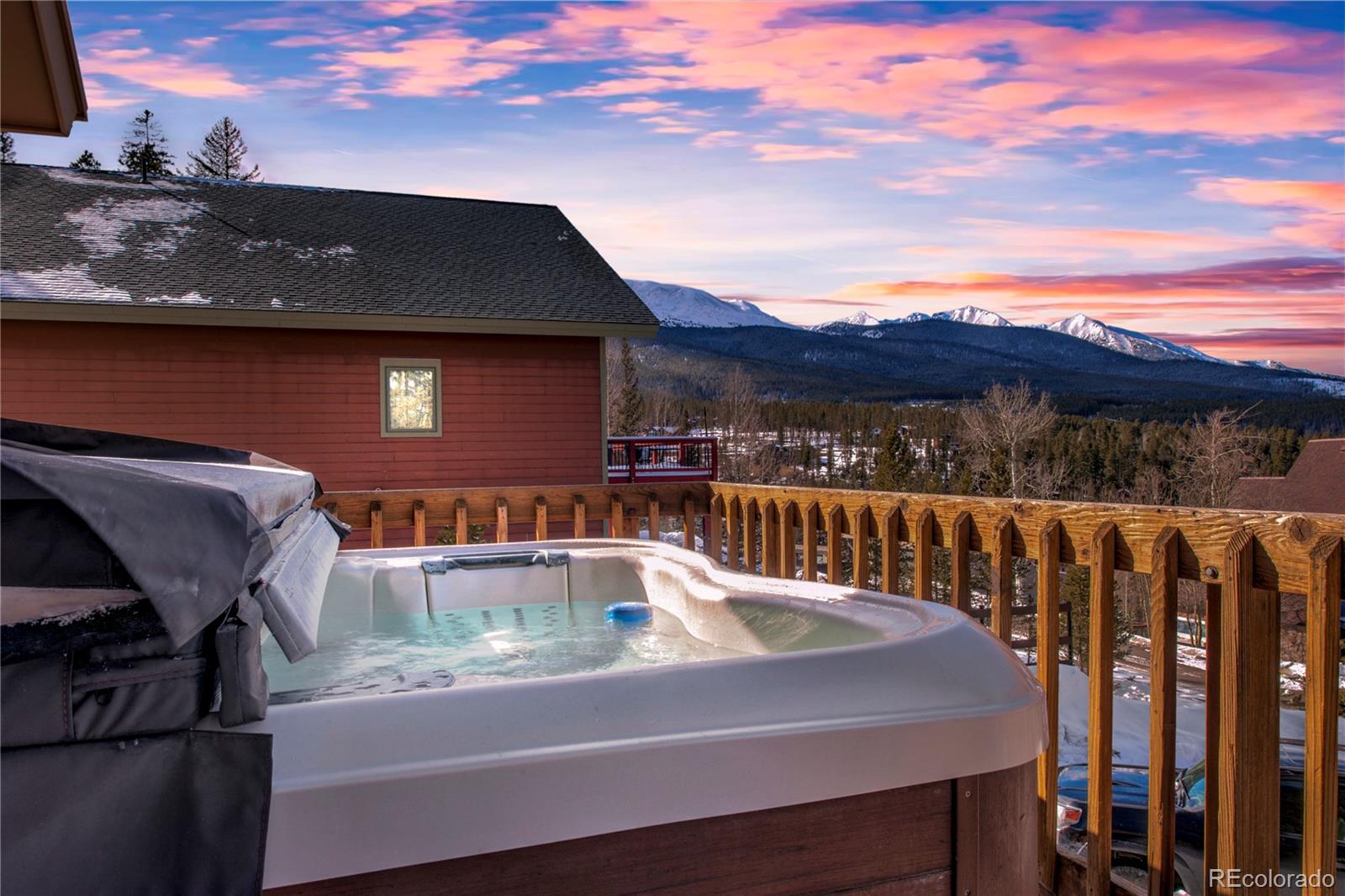 146 Protector Place Breckenridge, CO 80424 - Photo 16 of 18 a view of a patio with a table under an umbrella