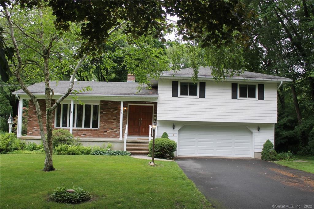 500 Allerton Road Naugatuck, CT 06770 - Photo 1 of 1 a front view of a house with a garden