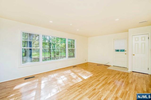 10 Gwynne Court Closter, NJ 07624 - Photo 6 of 22 a view of an empty room and window