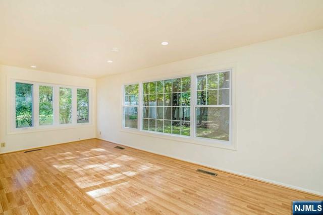 10 Gwynne Court Closter, NJ 07624 - Photo 7 of 22 a view of an empty room with a window