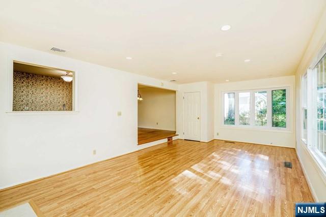 10 Gwynne Court Closter, NJ 07624 - Photo 8 of 22 a view of an empty room and window