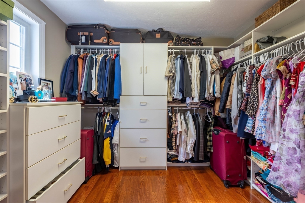 63 Lippold Street Methuen, MA 01844 - Photo 17 of 42 a view of walk in closet with clothes