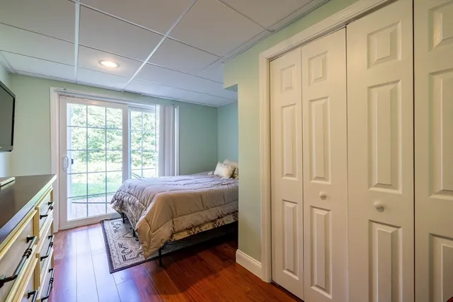 a bed room with a bed and a window