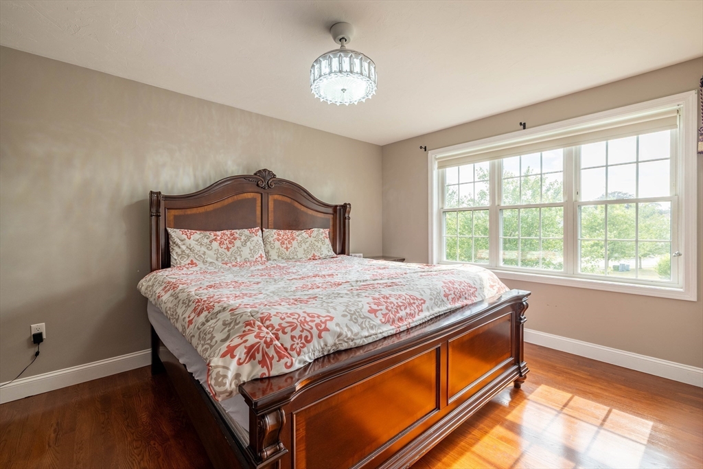 63 Lippold Street Methuen, MA 01844 - Photo 24 of 42 a bedroom with a bed and a window