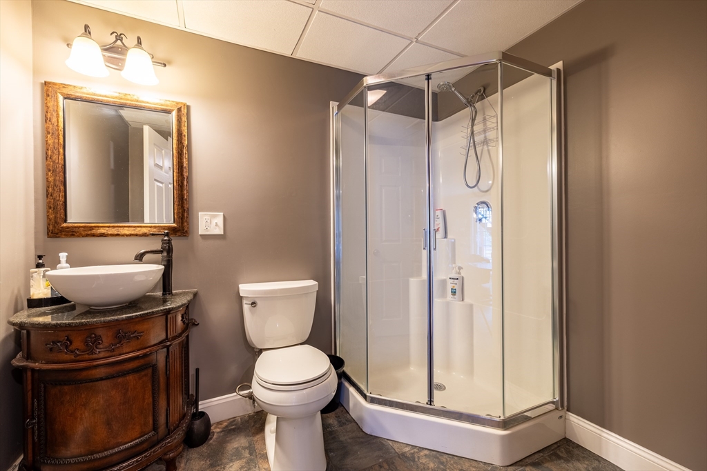 63 Lippold Street Methuen, MA 01844 - Photo 26 of 42 a bathroom with a toilet a sink and shower