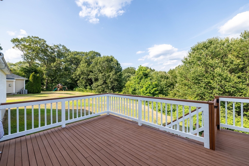 63 Lippold Street Methuen, MA 01844 - Photo 32 of 42 a view of a wooden roof deck