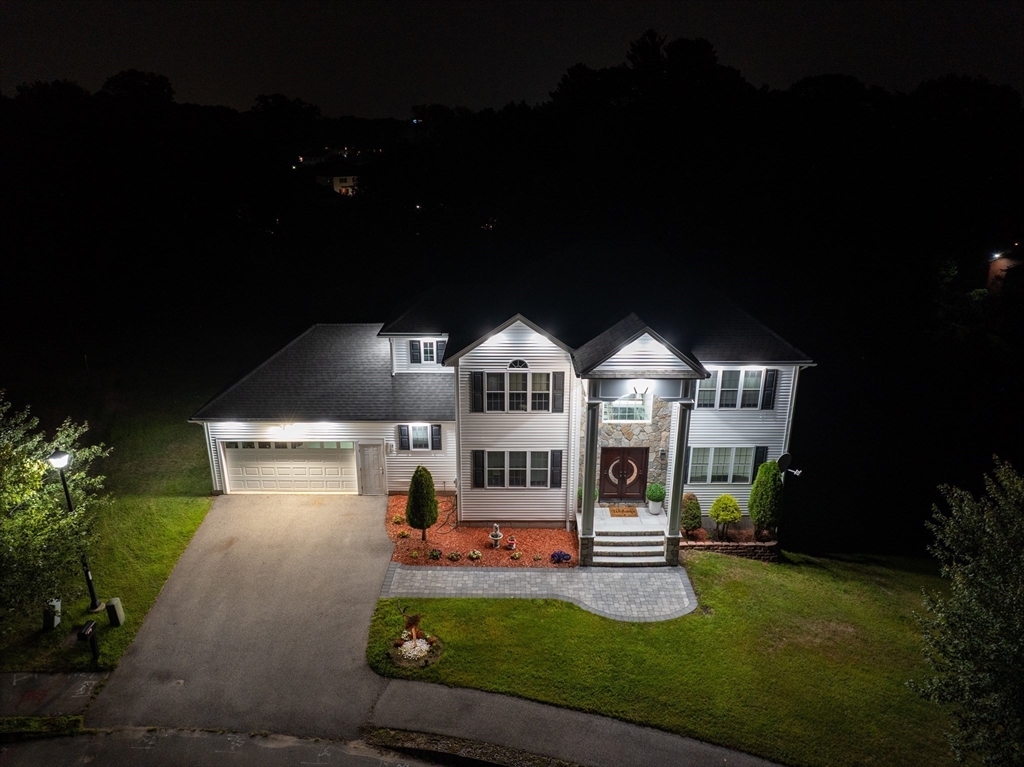 63 Lippold Street Methuen, MA 01844 - Photo 38 of 42 a front view of a house with a yard