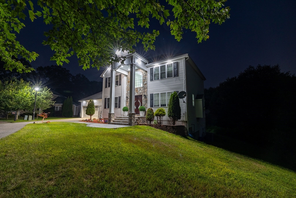 63 Lippold Street Methuen, MA 01844 - Photo 39 of 42 a view of a house with backyard porch and sitting area