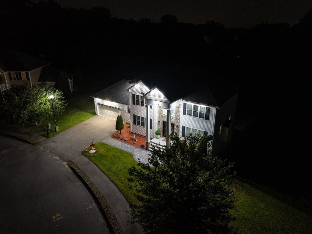 63 Lippold Street Methuen, MA 01844 - Photo 4 of 42 a front view of a house with garden
