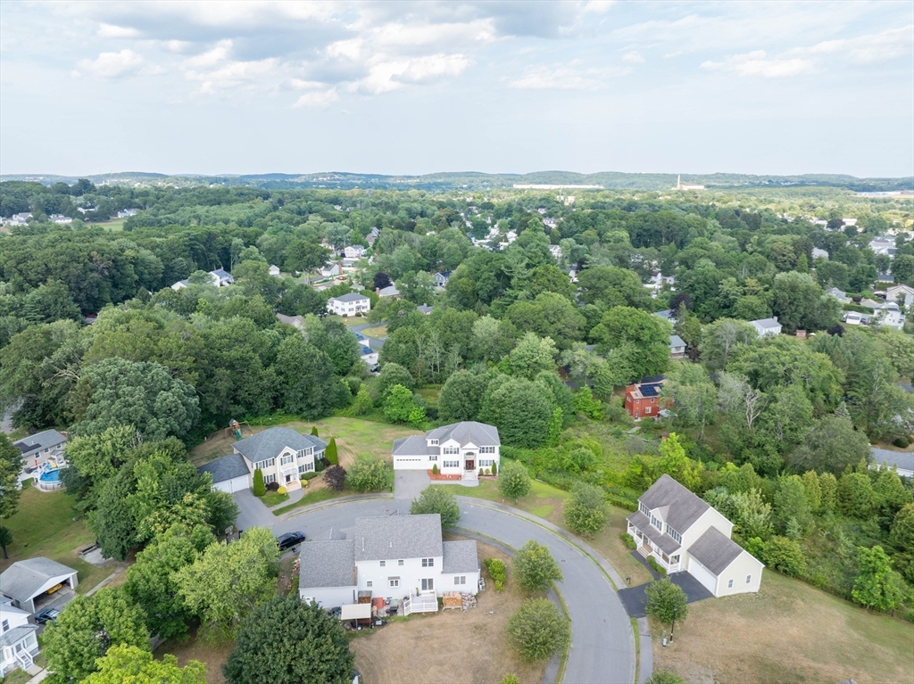 63 Lippold Street Methuen, MA 01844 - Photo 41 of 42 an aerial view of a house with yard
