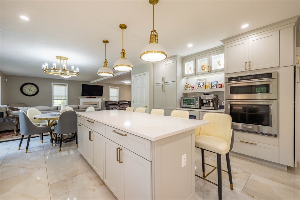 63 Lippold Street Methuen, MA 01844 - Photo 10 of 42 a kitchen with cabinets a sink and appliances