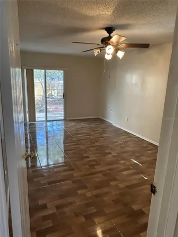 a view of a livingroom with a fan