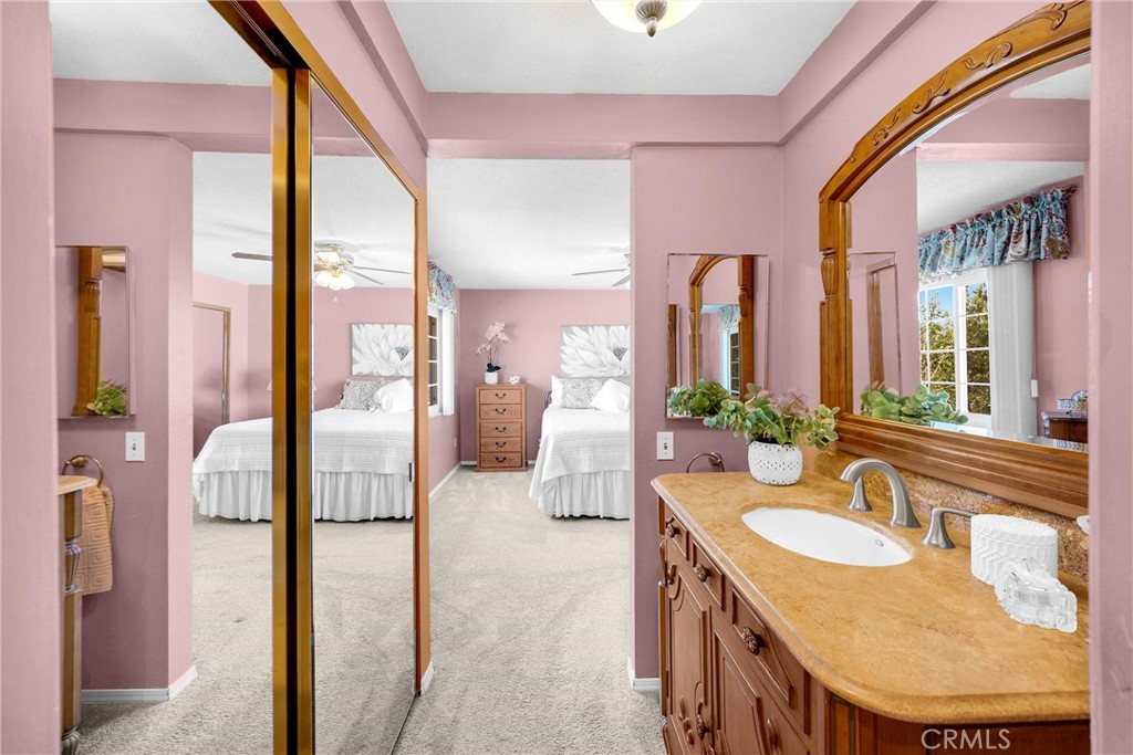 1934 Westmoreland Drive Brea, CA 92821 - Photo 26 of 50 a en suite bathroom with a granite countertop sink and a mirror