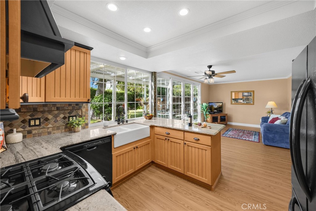 1934 Westmoreland Drive Brea, CA 92821 - Photo 8 of 50 a kitchen with lots of counter top space and wooden floor