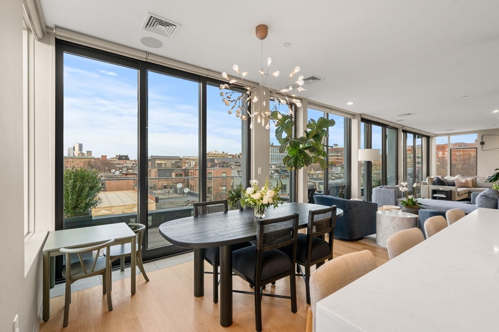 7 East Springfield Street, Unit PH6 Boston, MA 02118 - Photo 14 of 42 a living room with furniture and a large window