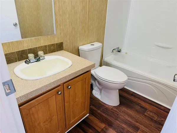 a bathroom with a sink and a toilet