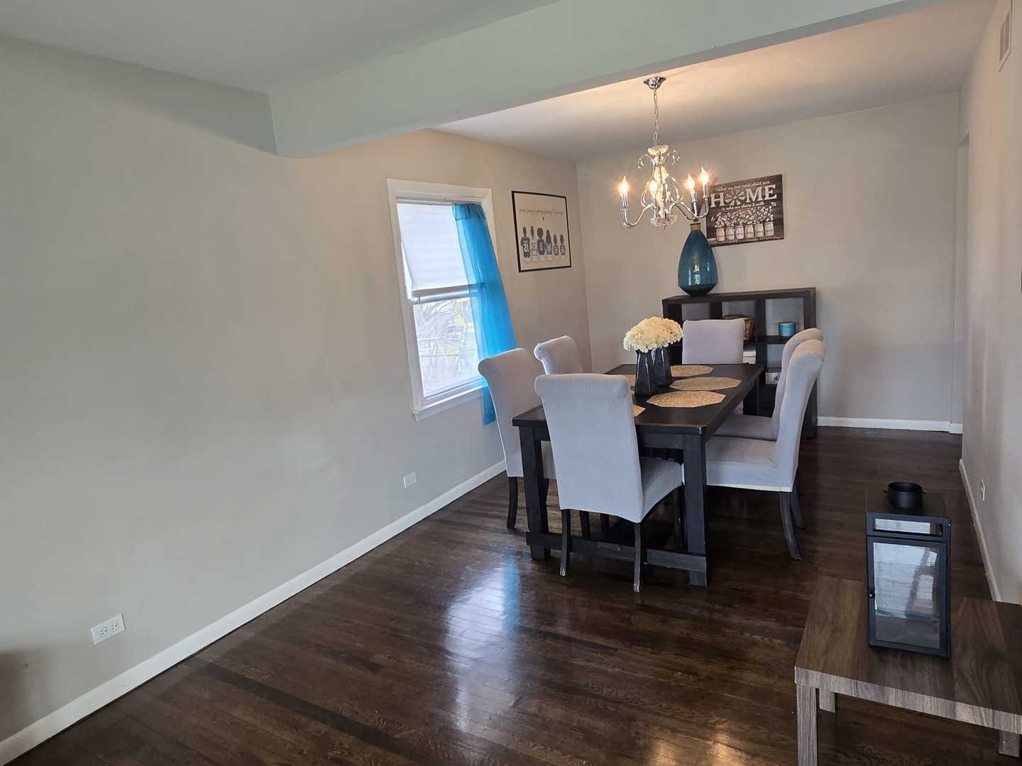 3006 Buttonwood Walk Hazel Crest, IL 60429 - Photo 7 of 18 a view of a dining room with furniture and wooden floor