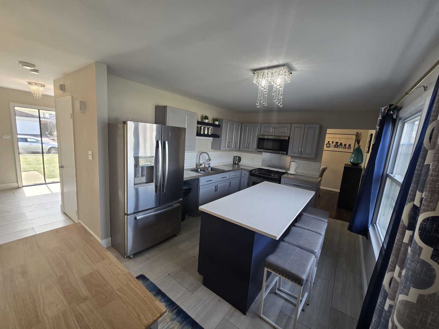3006 Buttonwood Walk Hazel Crest, IL 60429 - Photo 9 of 18 a view of kitchen with refrigerator stove and wooden floor