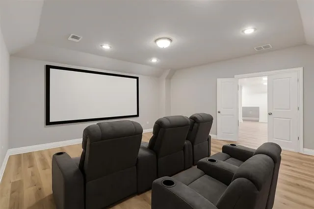 a projector room with furniture