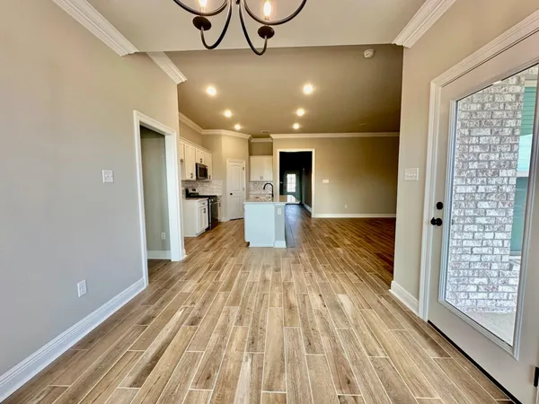 a view of a living room with a large window