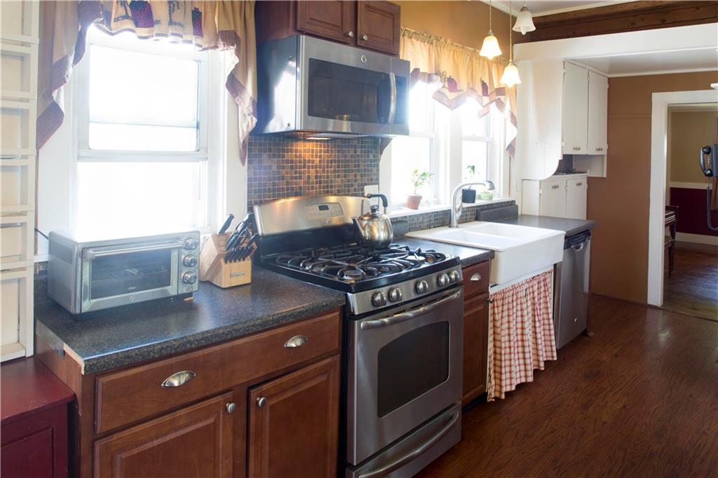 514 Main Road Bradford, ME 04410 - Photo 10 of 35 Stainless steel appliances & tiled...