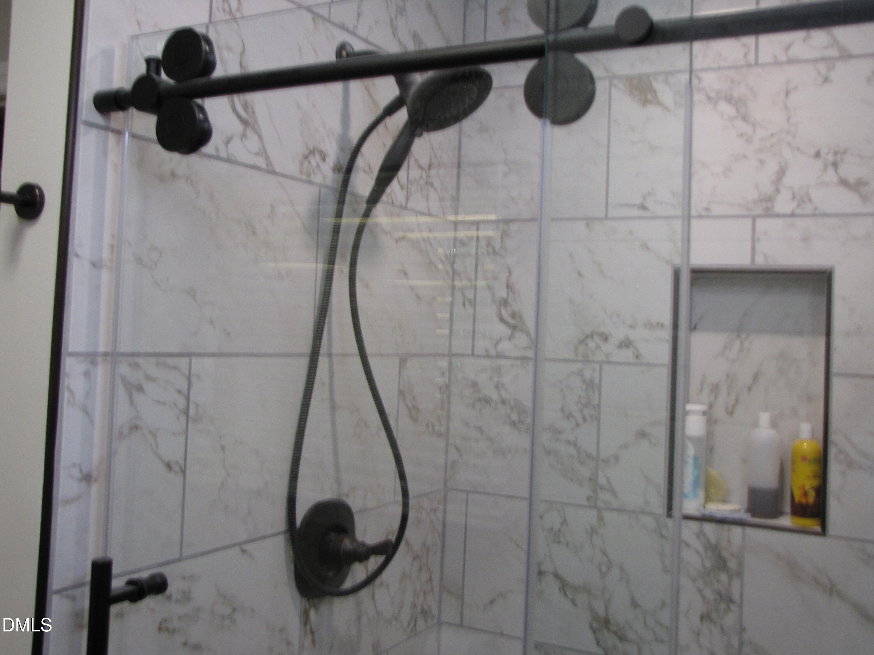 2907 Elgin Street Durham, NC 27704 - Photo 14 of 19 a bathroom with a shower