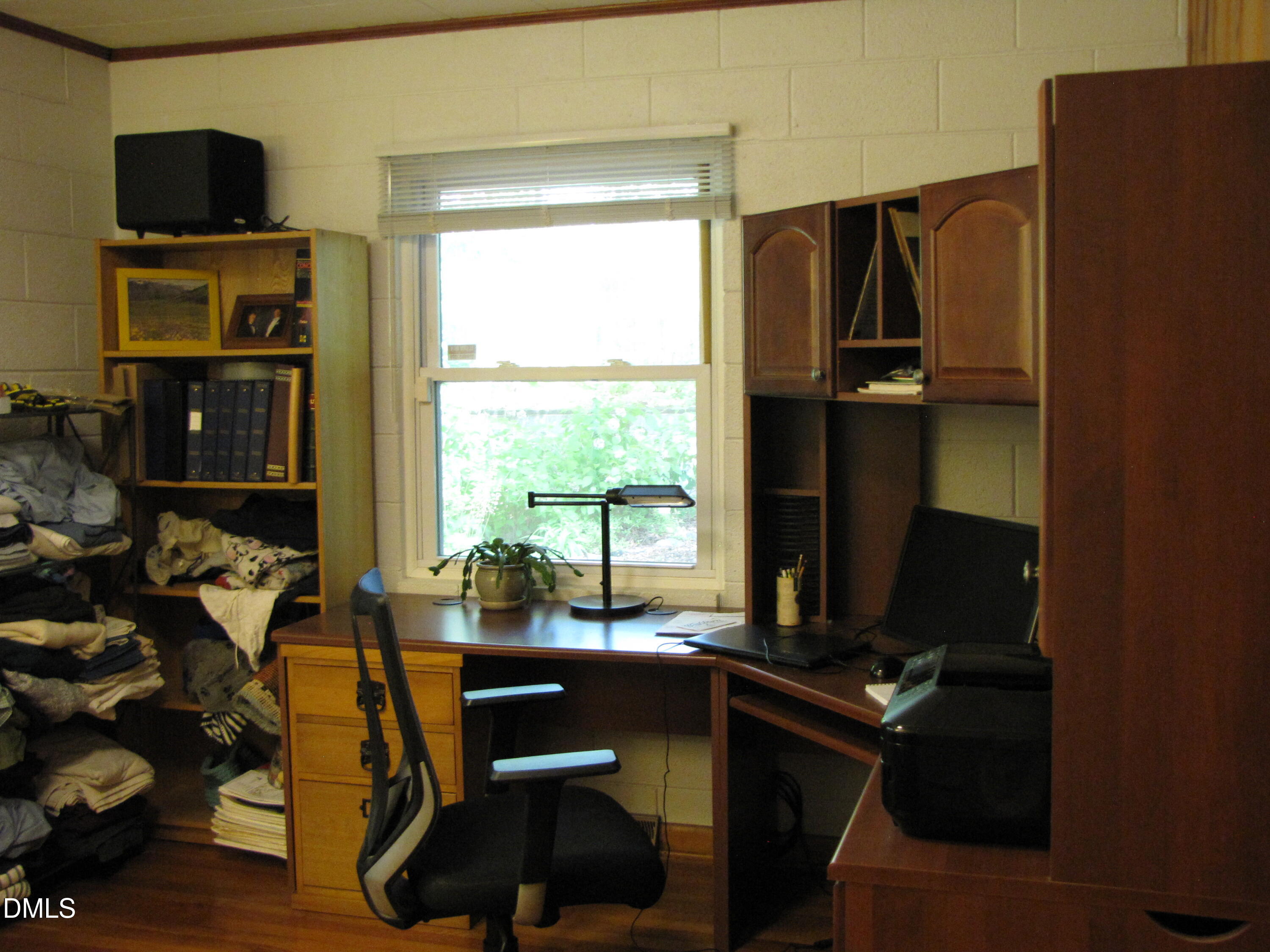 2907 Elgin Street Durham, NC 27704 - Photo 16 of 19 a view of a workspace with furniture and a window