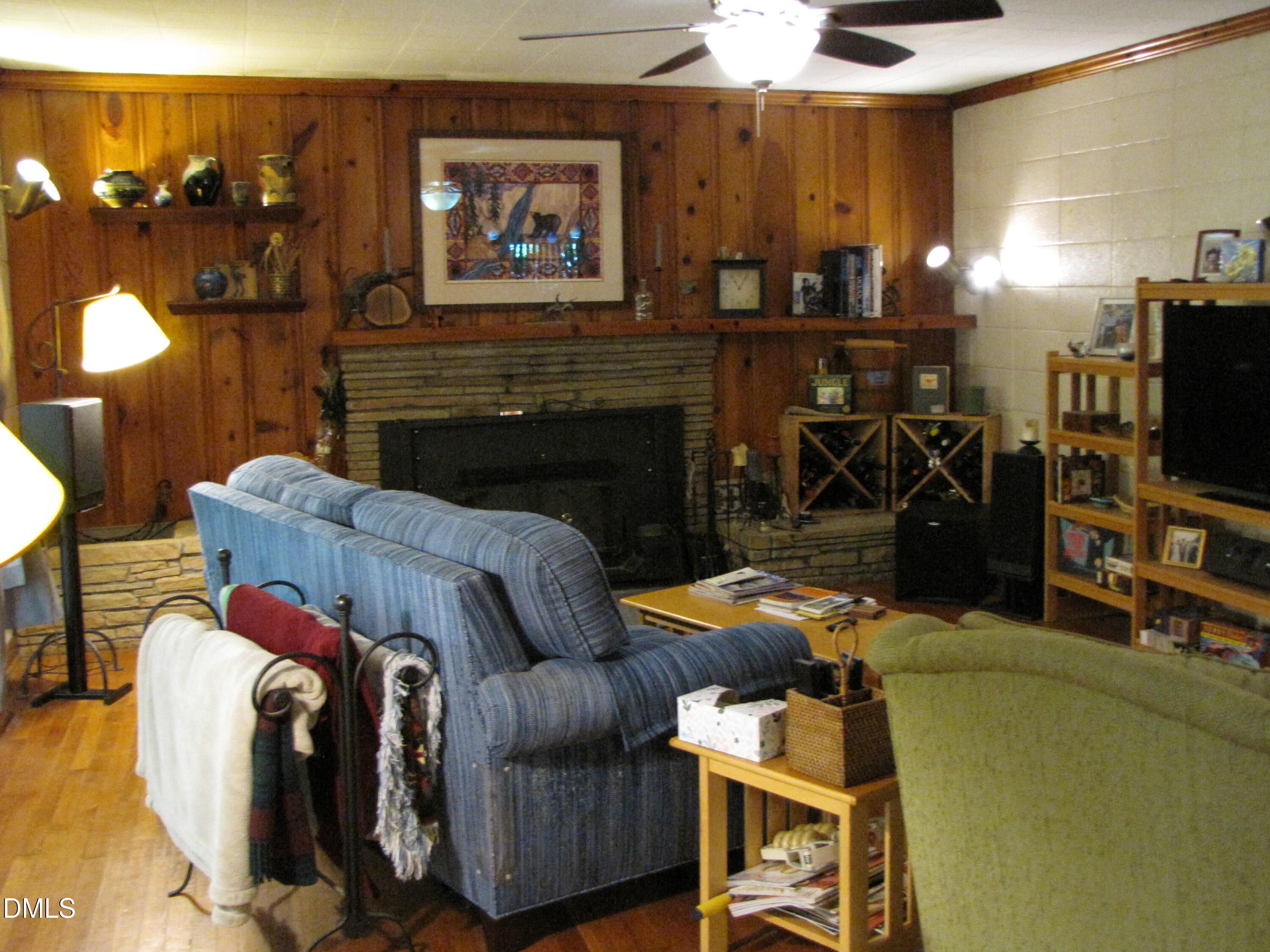 2907 Elgin Street Durham, NC 27704 - Photo 3 of 19 a living room with furniture and a fireplace