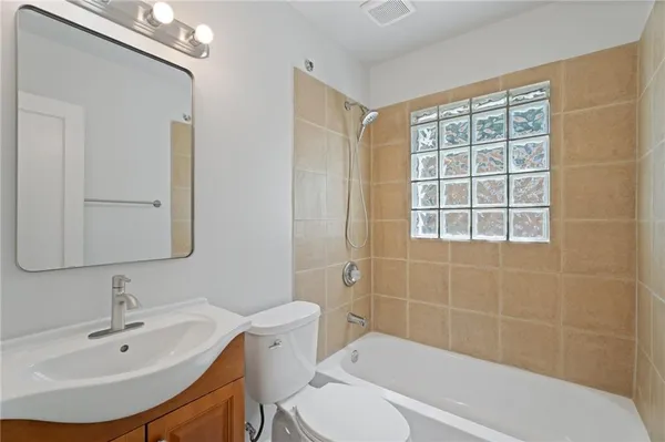 a bathroom with a sink and a bathtub