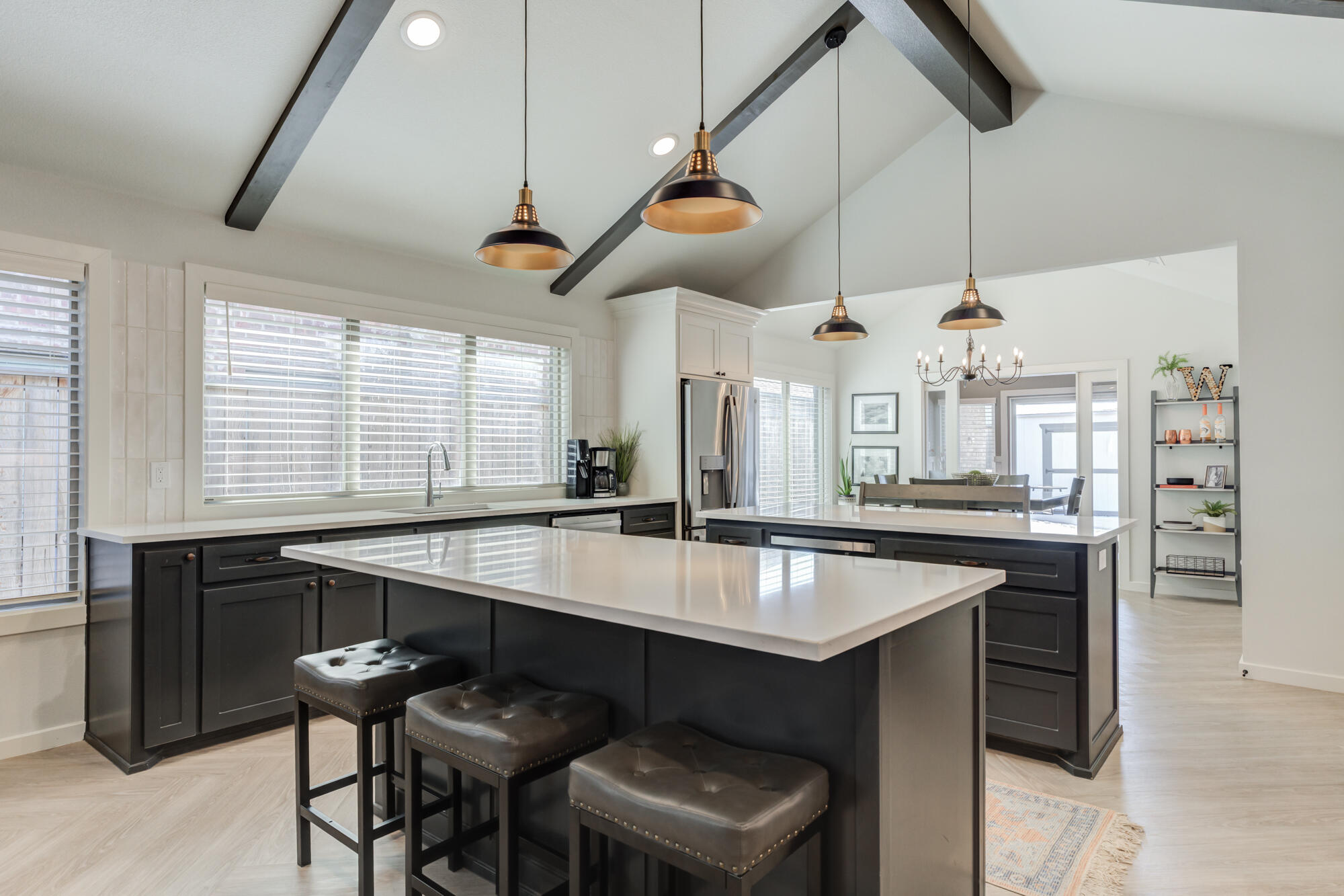 3627 128th Street Lubbock, TX 79423 - Photo 14 of 60 a kitchen with a table and chairs in it