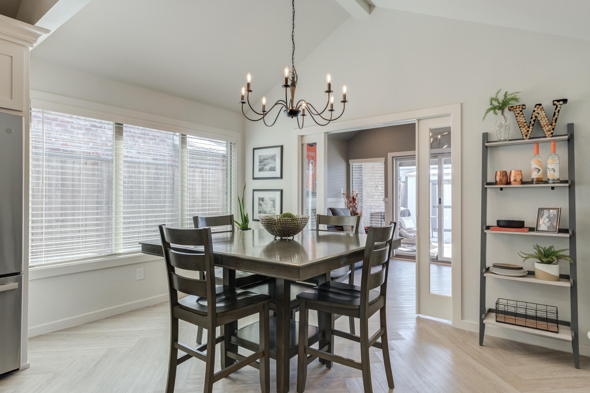 3627 128th Street Lubbock, TX 79423 - Photo 23 of 60 a view of a dining room with furniture window and wooden floor