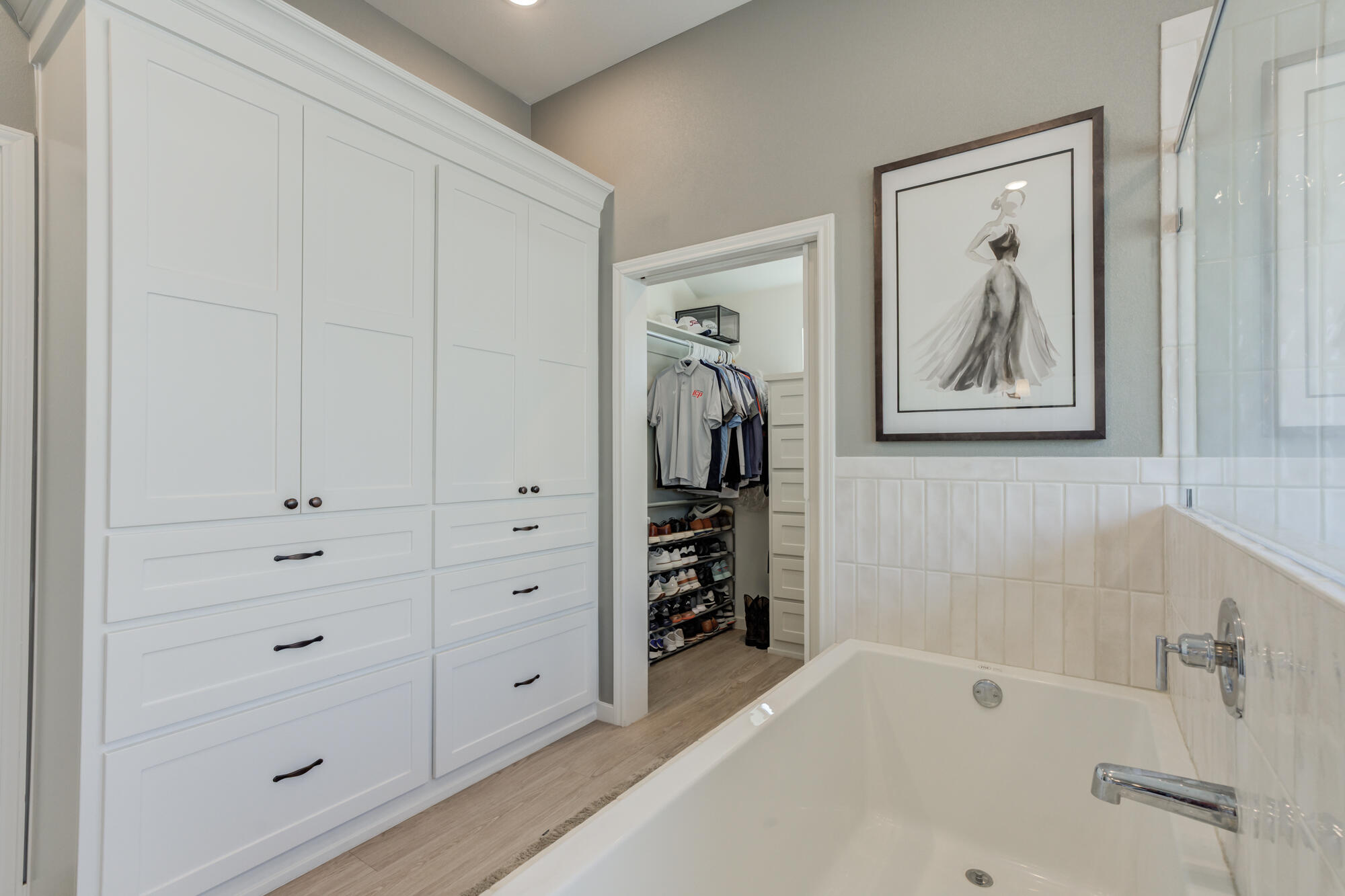 3627 128th Street Lubbock, TX 79423 - Photo 35 of 60 a bathroom with a bathtub and a shower