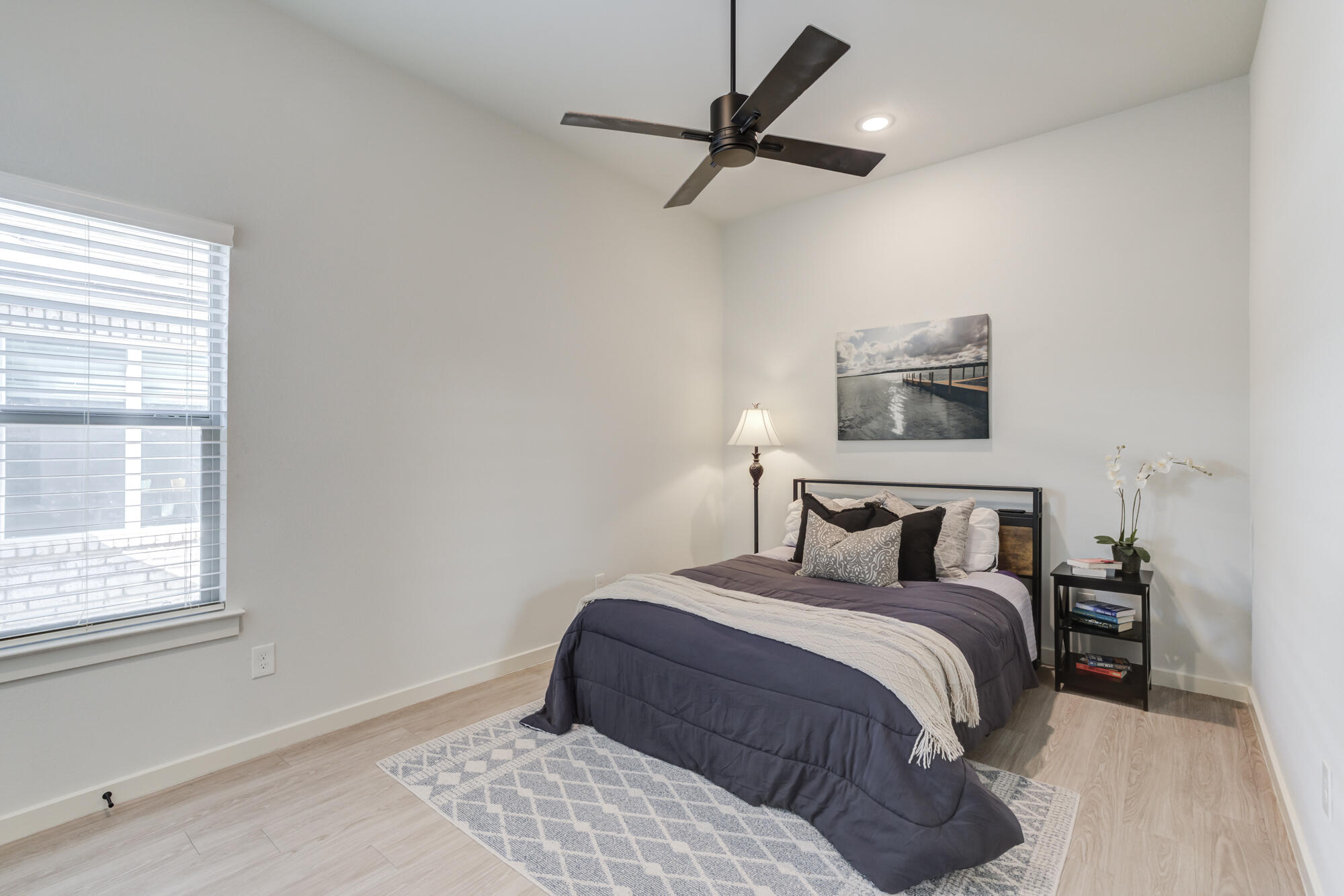 3627 128th Street Lubbock, TX 79423 - Photo 38 of 60 a bedroom with a bed and a window