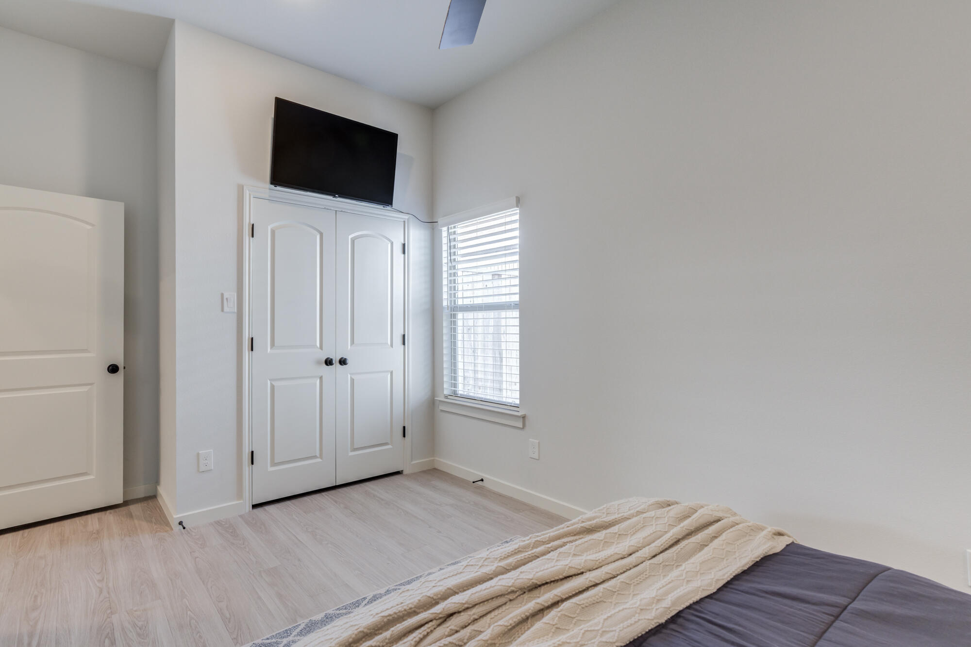 3627 128th Street Lubbock, TX 79423 - Photo 39 of 60 a view of empty room with wooden floor and fan