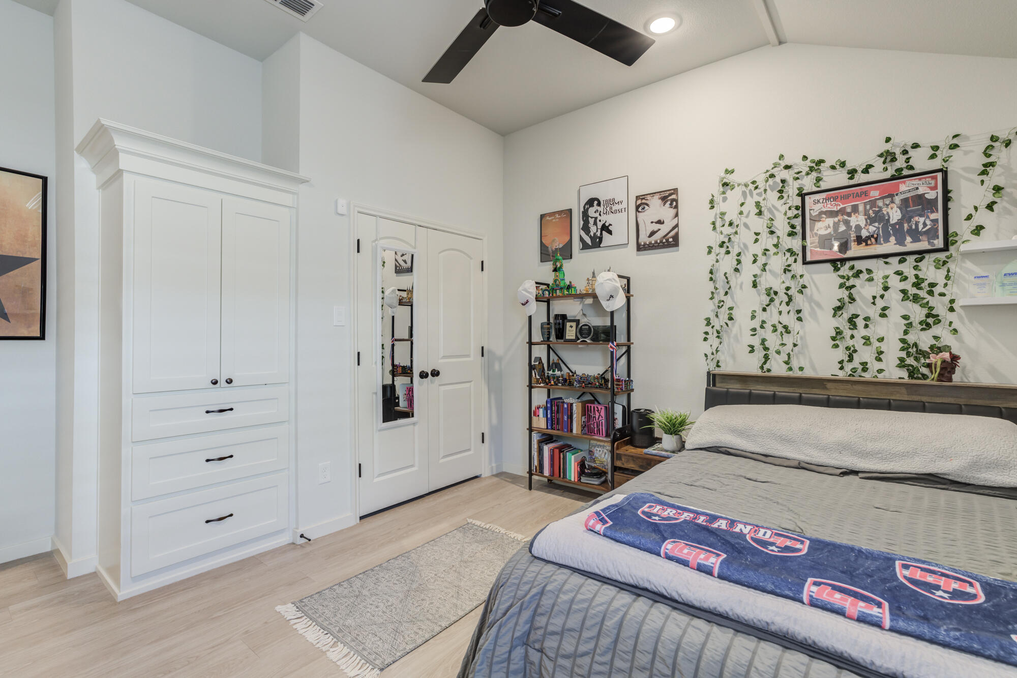 3627 128th Street Lubbock, TX 79423 - Photo 43 of 60 a bedroom with a bed and a dresser