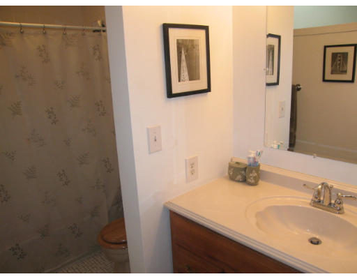 116 Mountain Gate Road, Unit 116 Ashland, MA 01721 - Photo 15 of 20 a bathroom with a sink and a mirror