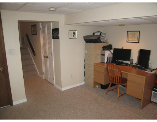 116 Mountain Gate Road, Unit 116 Ashland, MA 01721 - Photo 9 of 20 a view of a workspace with furniture and a window