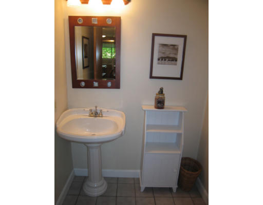 116 Mountain Gate Road, Unit 116 Ashland, MA 01721 - Photo 10 of 20 a bathroom with a sink and a mirror